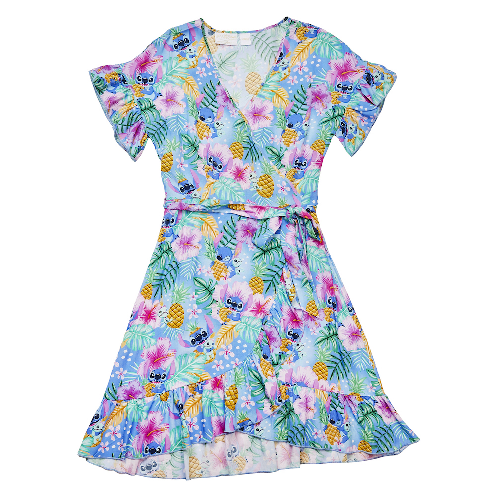 Front view of the Ilana Stitch Shoppe Dress, featuring an all-over tropical pattern with flowers, pineapples, and Stitch from Lilo and Stitch.